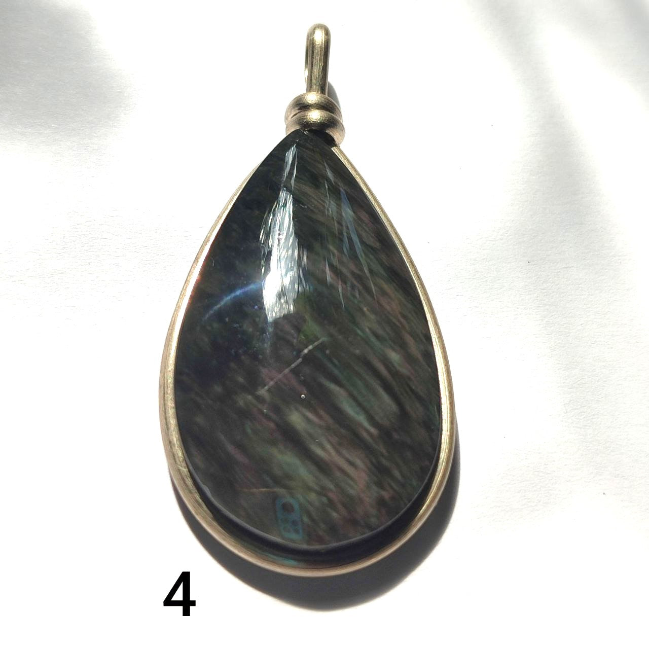 Colgante obsidiana manto huichol lagrima