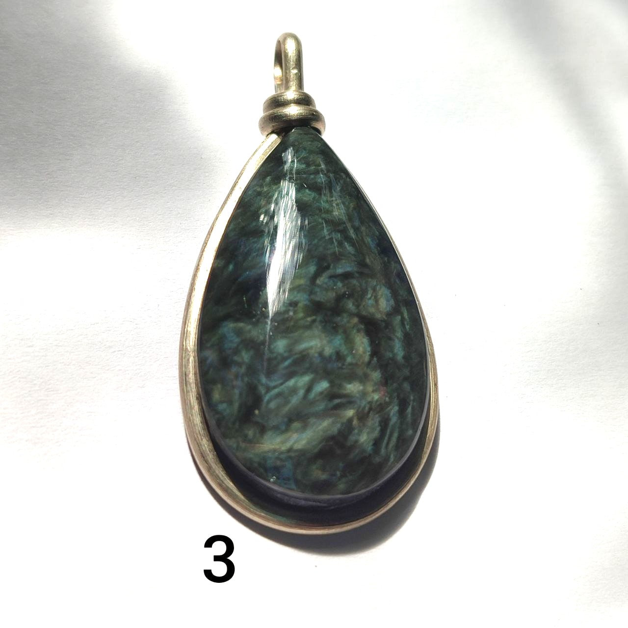 Colgante obsidiana manto huichol lagrima