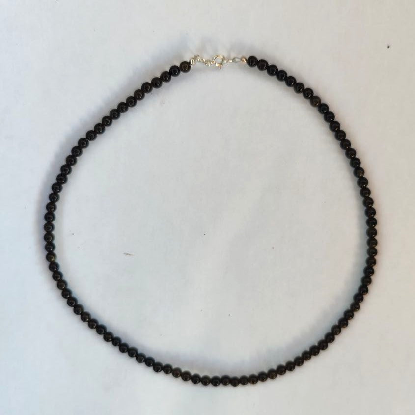 Collar de obsidiana dorada