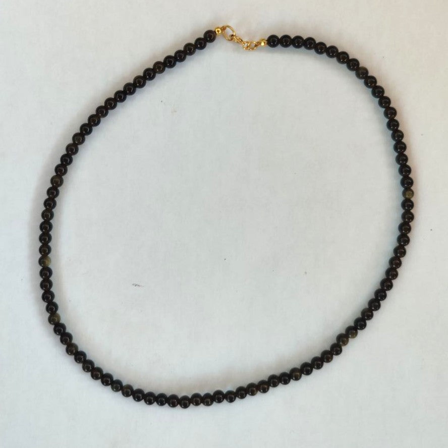 Collar de obsidiana dorada