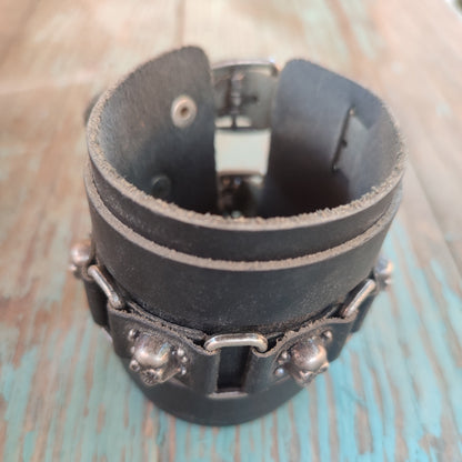 black leather bracelet with skulls