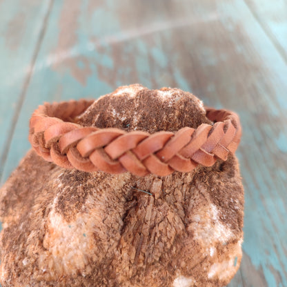 braided leather bracelet with four strands and stainless steel clasp