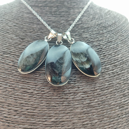 colgantes de obsidiana pateada artesanos, forma ovalada
