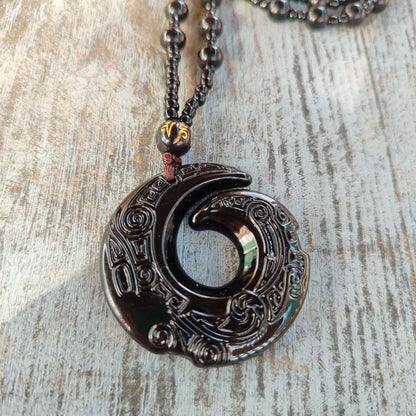 Carved black obsidian necklace