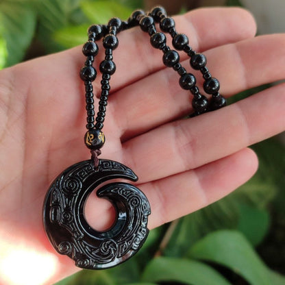 Carved black obsidian necklace