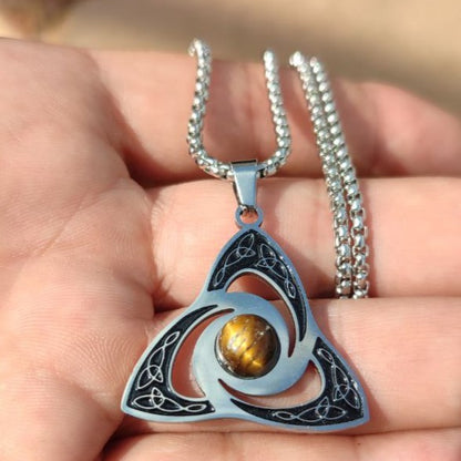 Pendant with triskele and tiger's eye