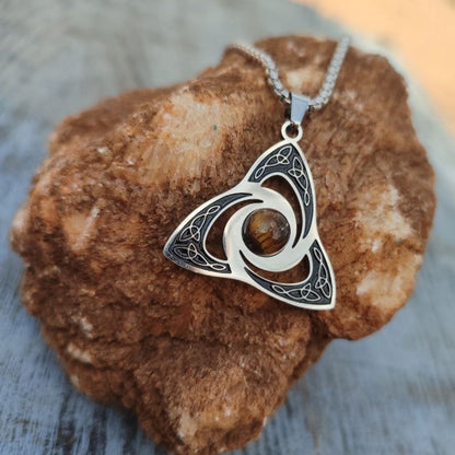 Pendant with triskele and tiger's eye