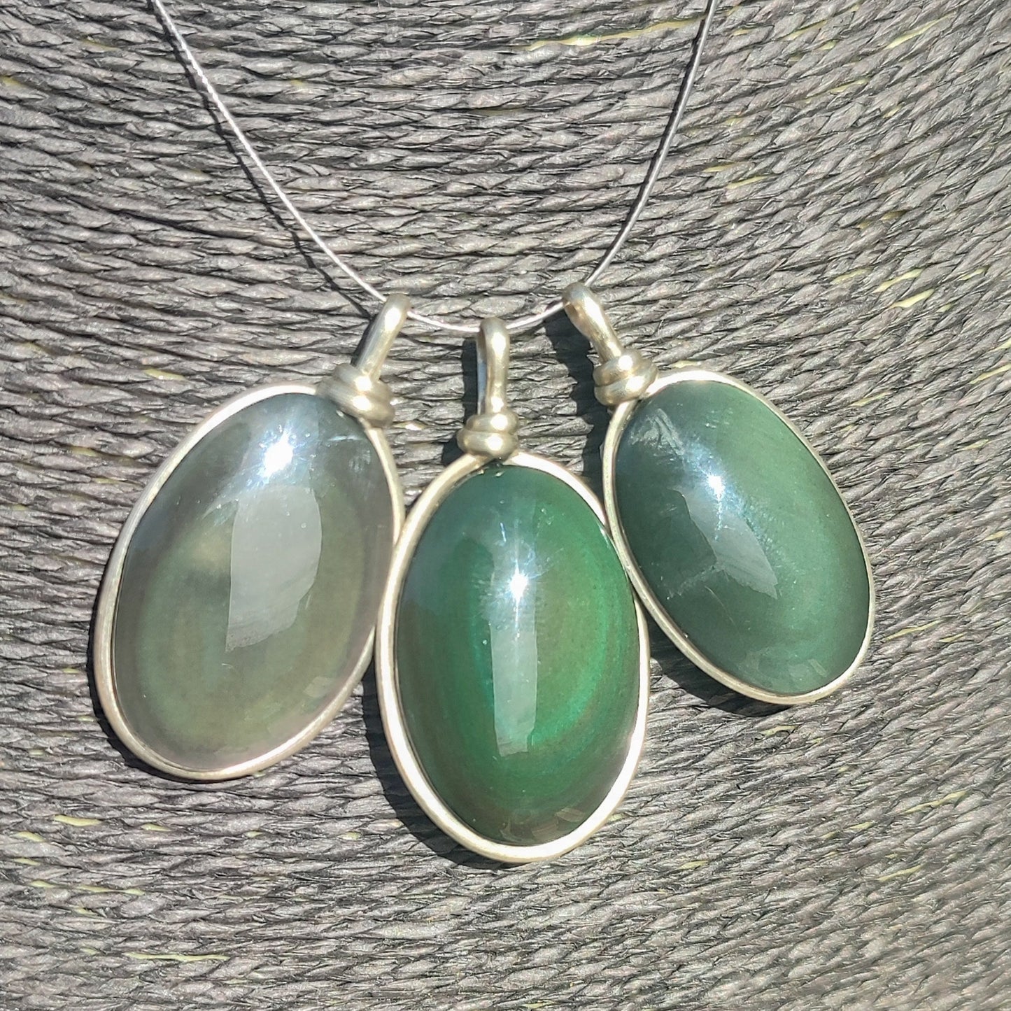 Oval rainbow obsidian pendant