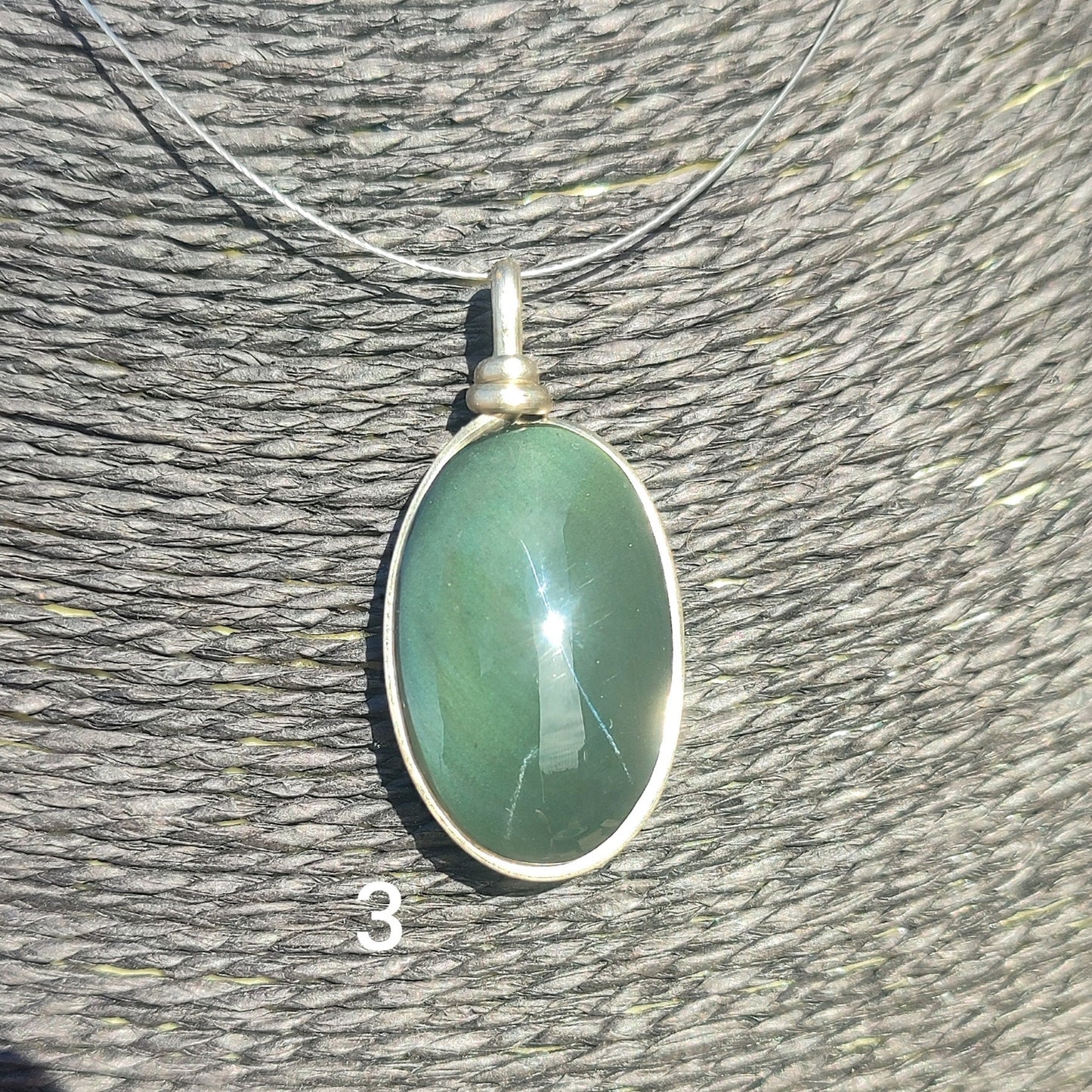 Oval rainbow obsidian pendant
