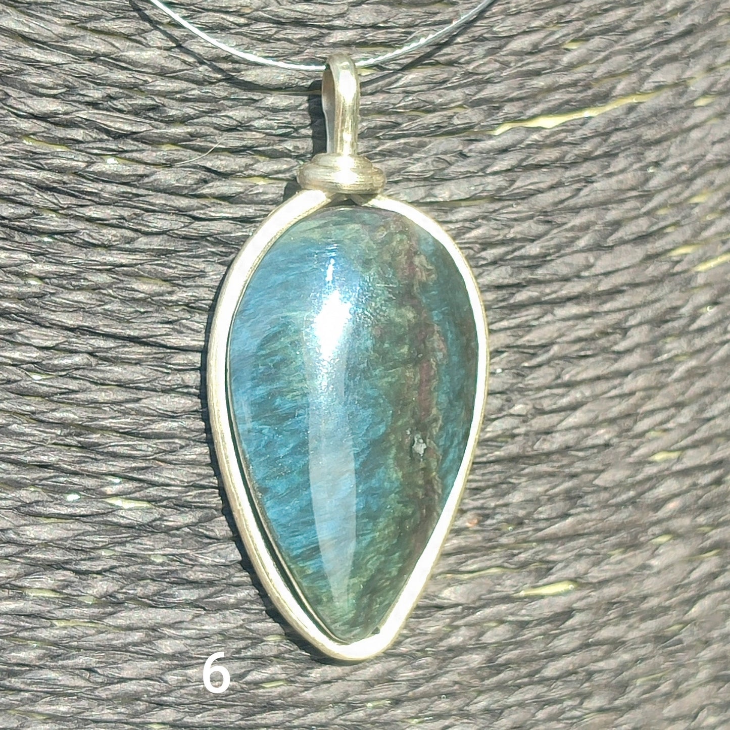 Huichol mantle teardrop obsidian pendant