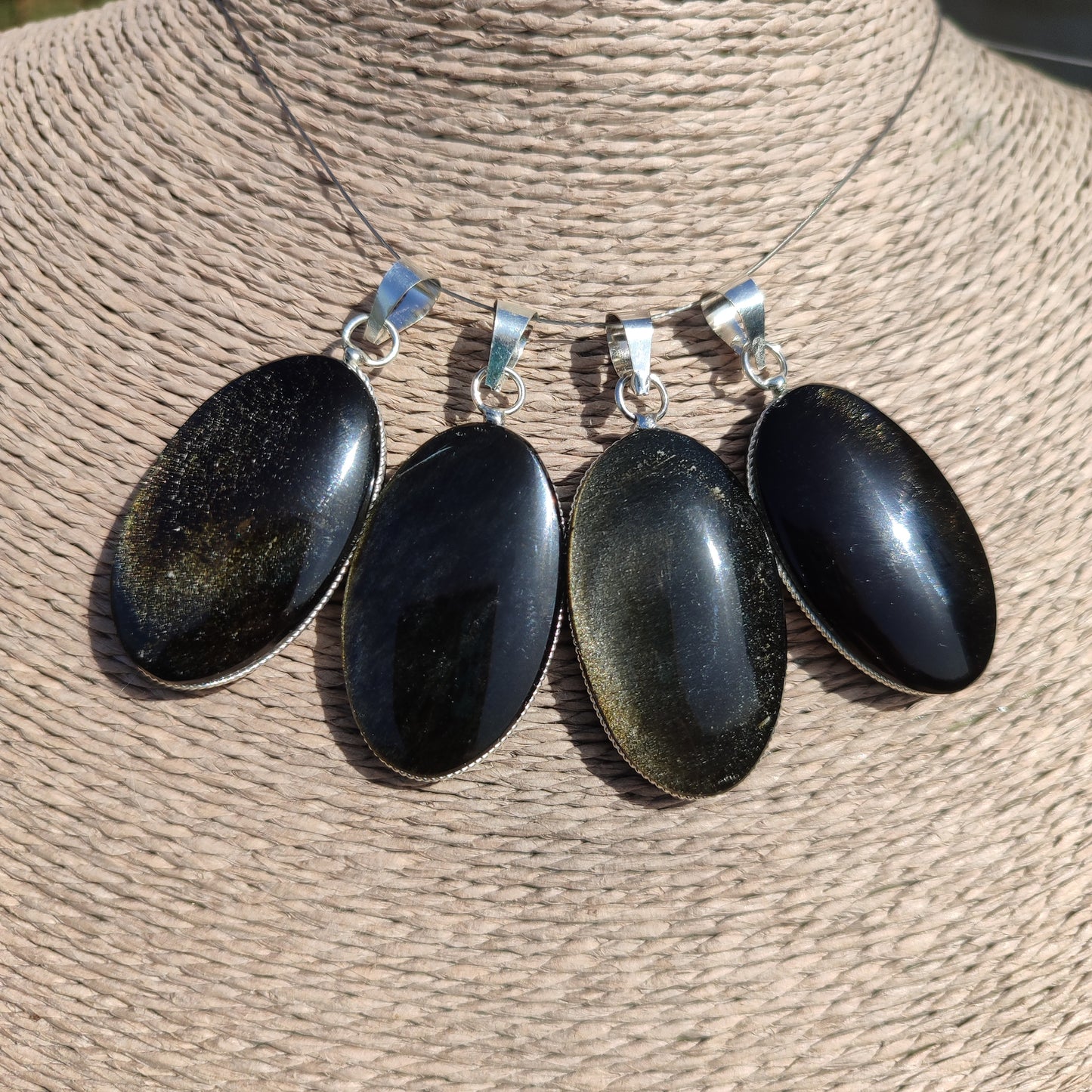 Colgante de obsidiana dorada ovalada