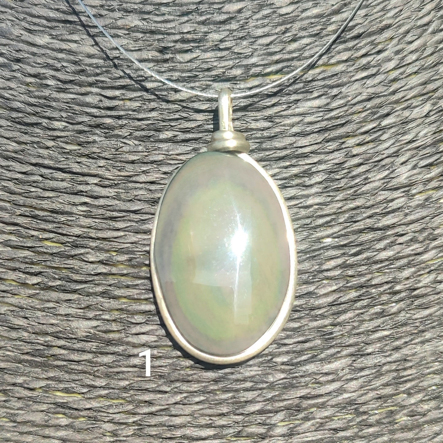 Oval rainbow obsidian pendant